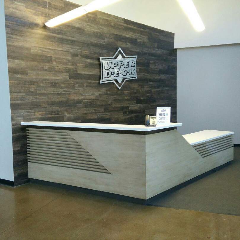 Custom wood entrance foyer and paneling for corporate office in San Diego